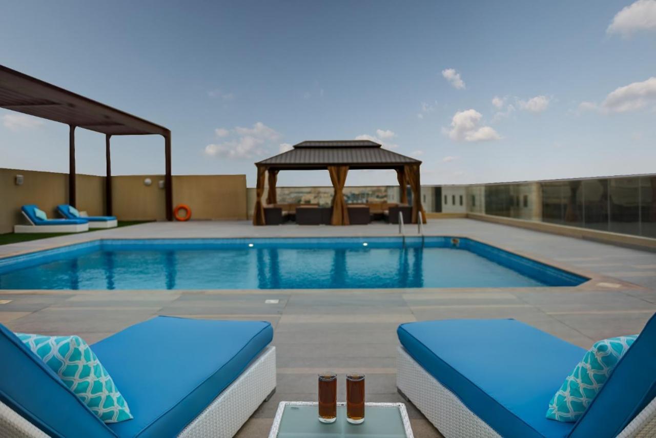 Abar Hotel Apartments Dip-1 Дубай Экстерьер фото