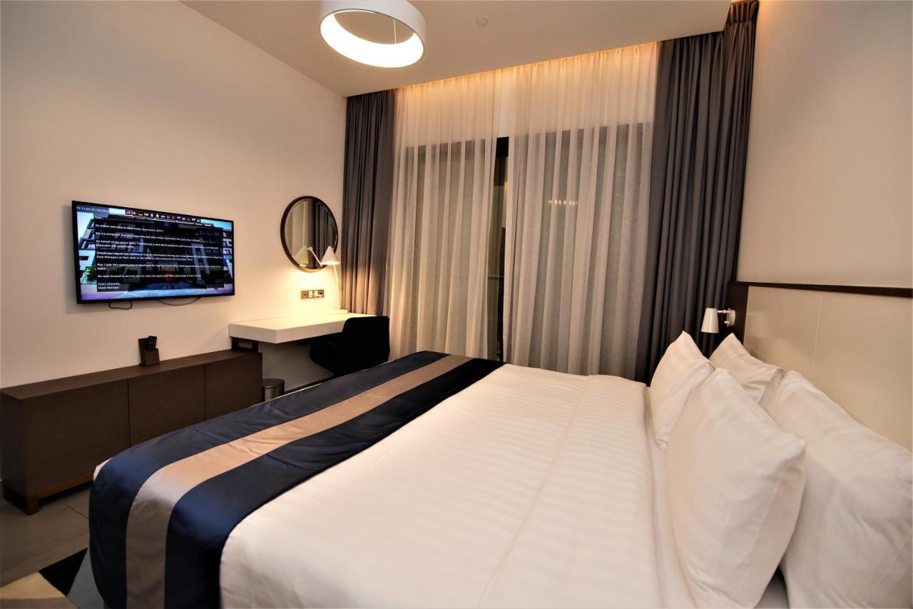 Abar Hotel Apartments Dip-1 Дубай Экстерьер фото